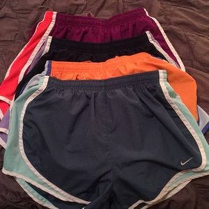 4 pairs size S Nike running shorts